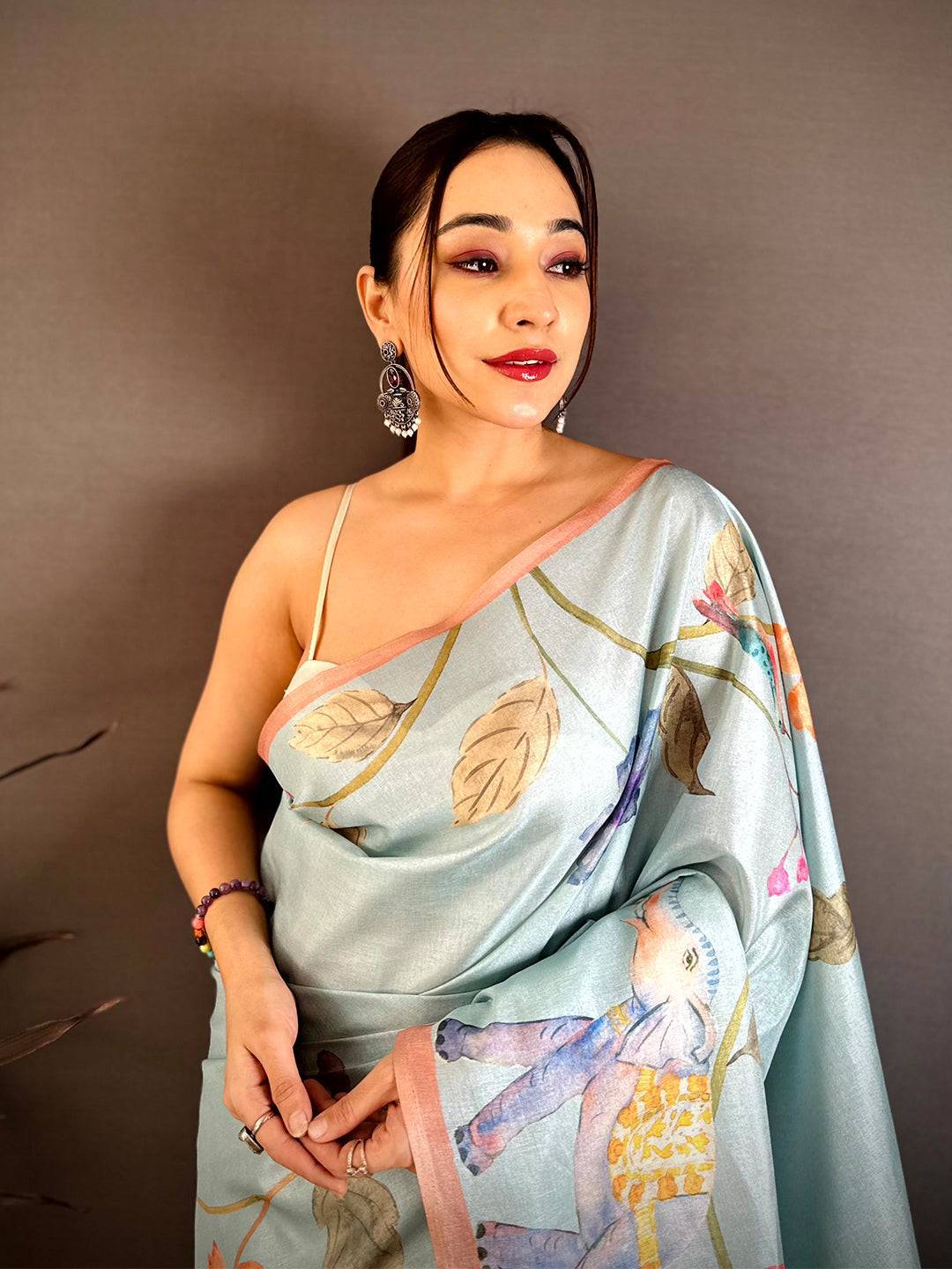 Sky Blue Tussar Floral Water Block Saree