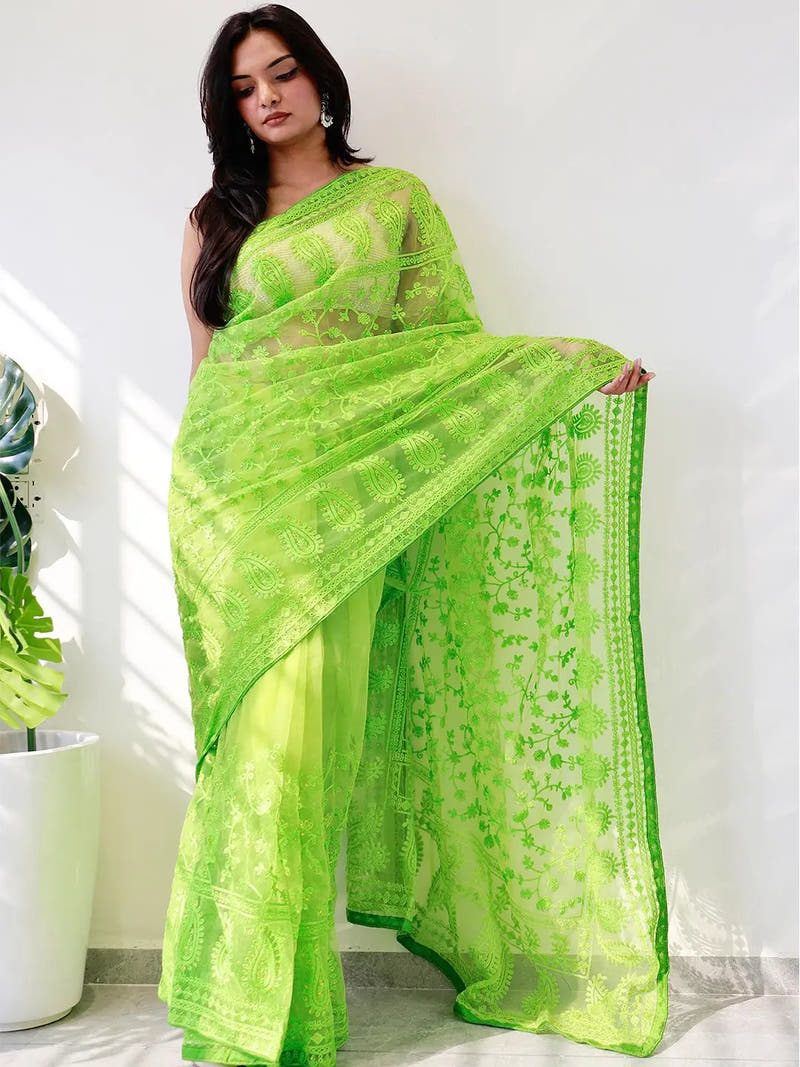Elegant Saree Adorned with Ethnic Motifs, Intricate Threadwork, and Embellished Borders