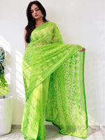 Elegant Saree Adorned with Ethnic Motifs, Intricate Threadwork, and Embellished Borders