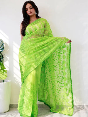Elegant Saree Adorned with Ethnic Motifs, Intricate Threadwork, and Embellished Borders