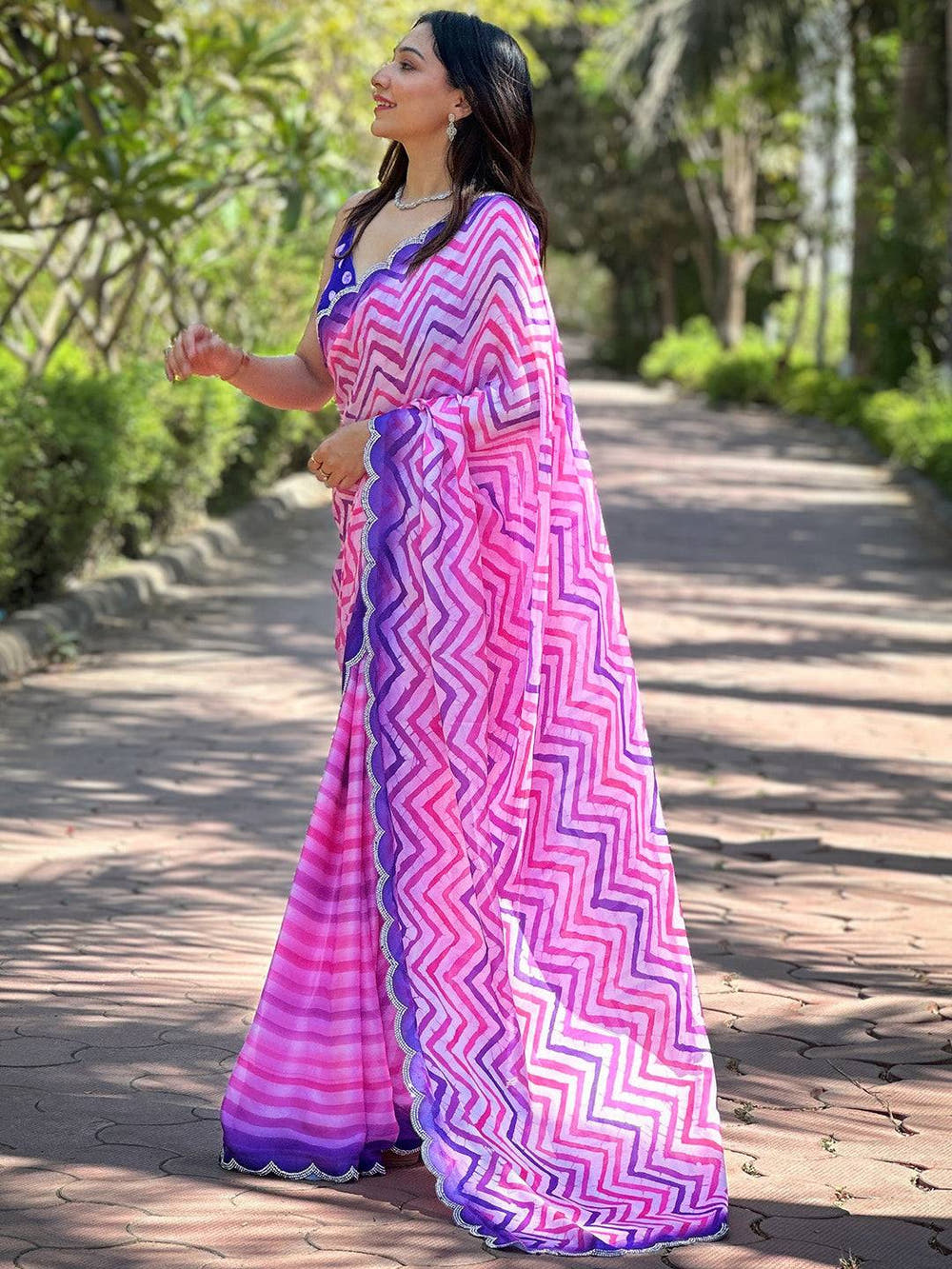 Trendy Leheriya And Striped Print Saree