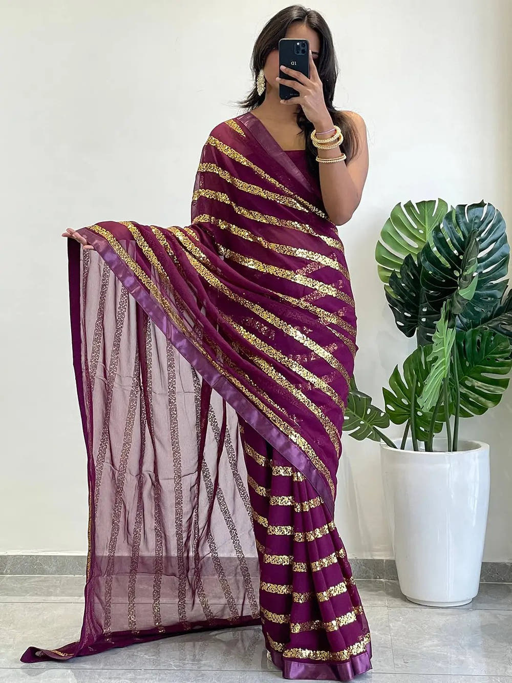 Modern Elegance Georgette Saree with Striped Sequins Work and Solid Border